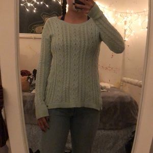 Knitted long sweater.